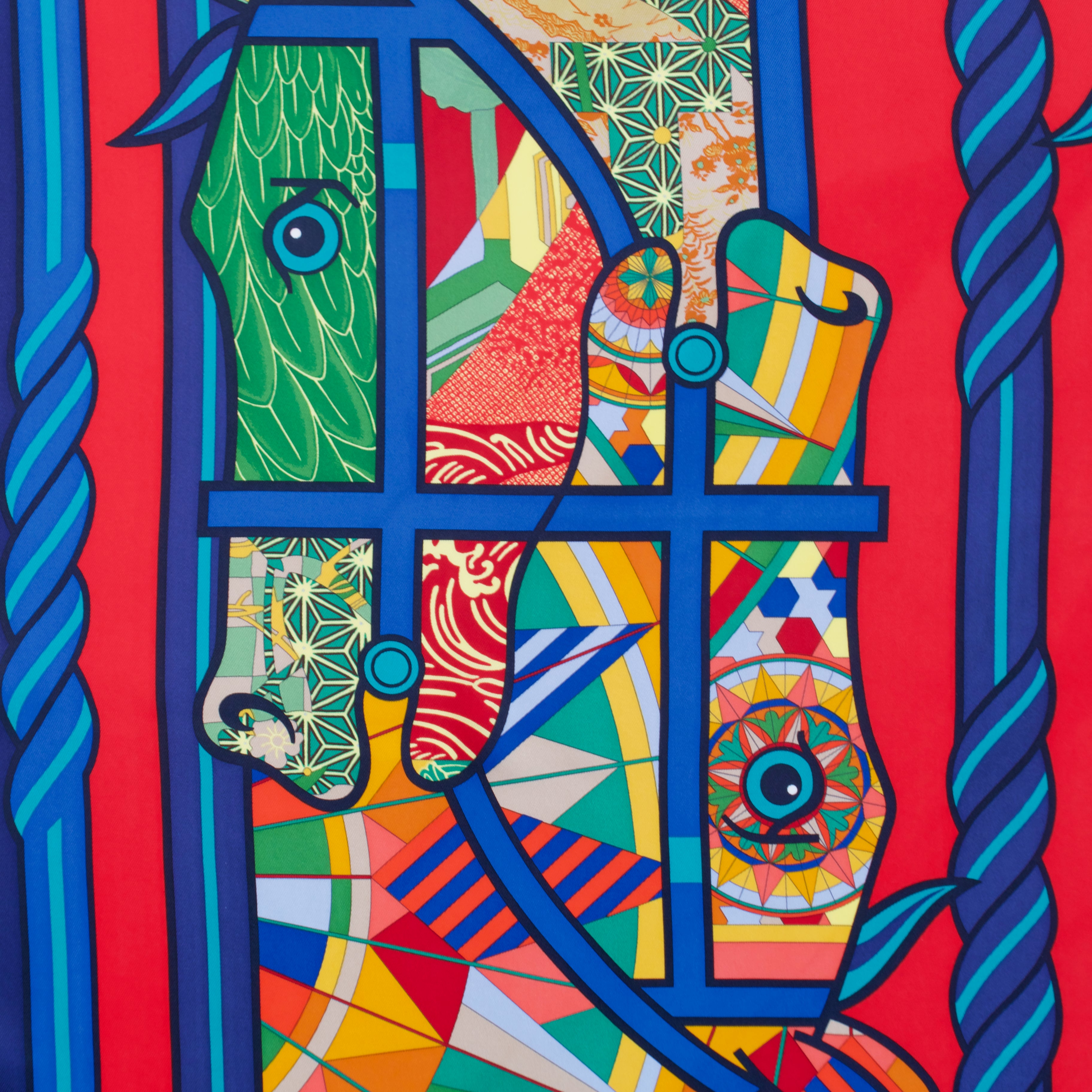 Carré Hermès Quadrige Costumé composition graphique motifs textiles rouges bleus et turquoise