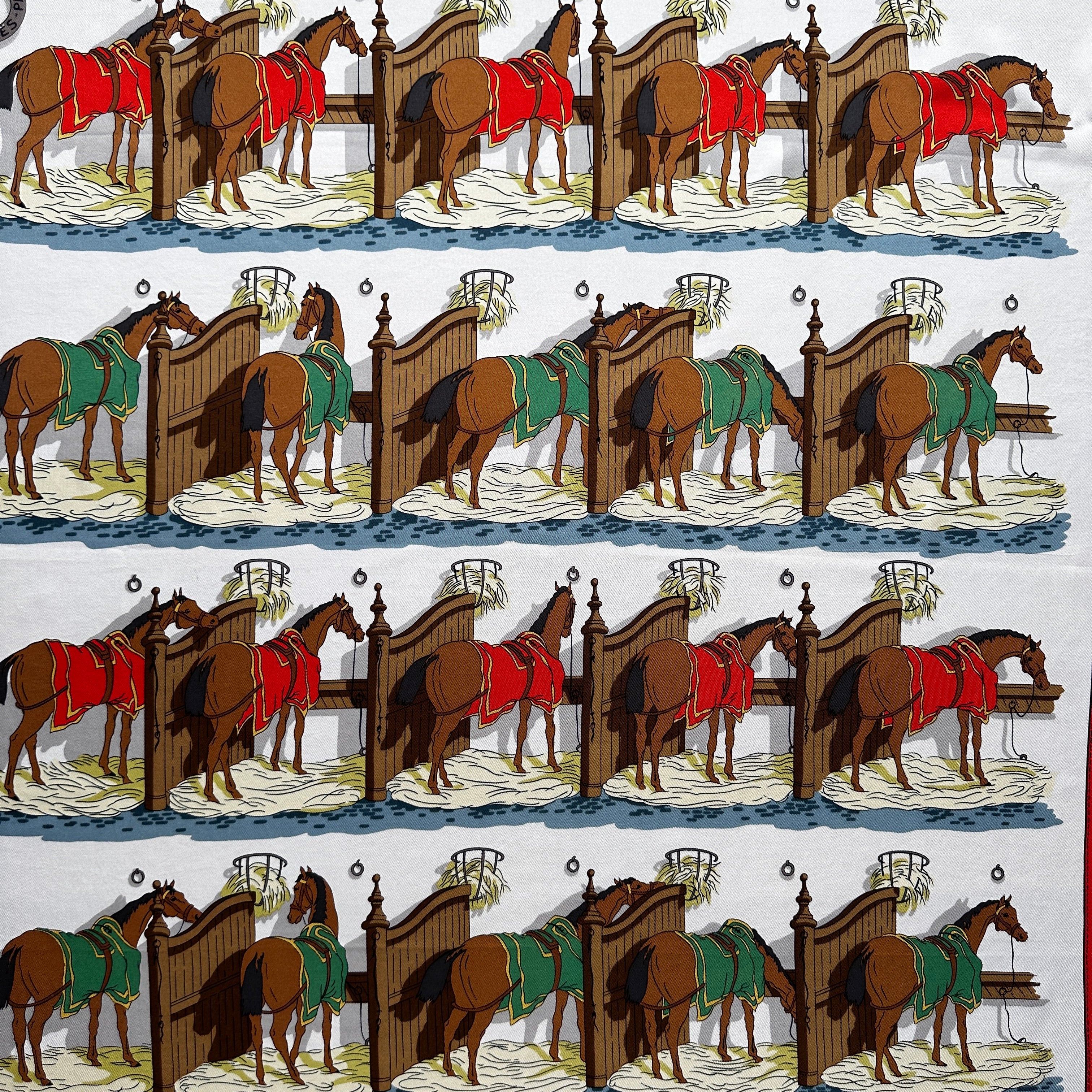 motif de chevaux dans leur boxe