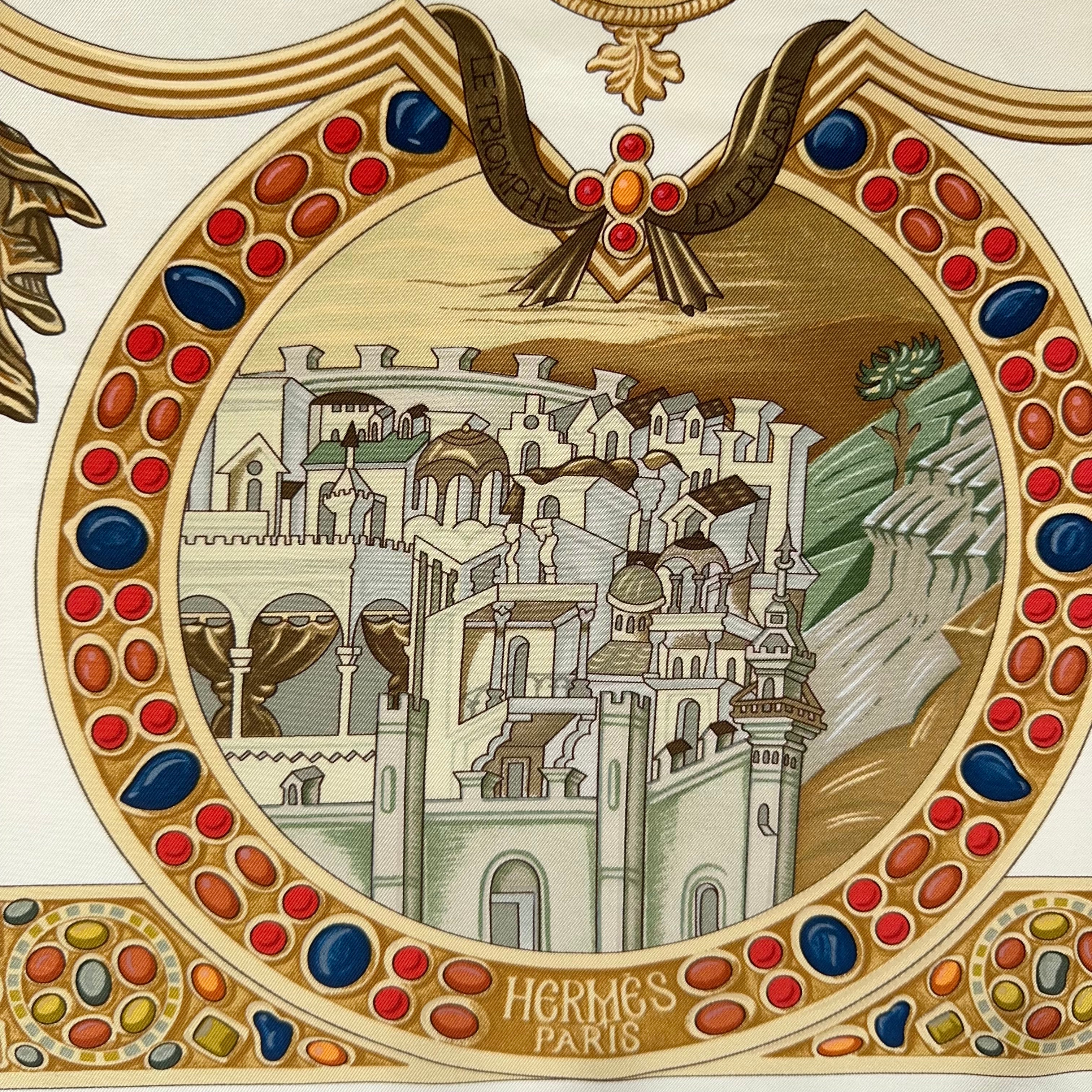 Détail du médaillon inférieur montrant une cité fortifiée (Jérusalem ou Cappadoce) et le logo "Hermès Paris" doré.